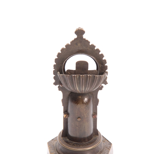 492 - A 19TH CENTURY GOTHIC STYLE BRONZE POCKET WATCH HOLDER depicting a guardsman on a stepped plinth 21c... 