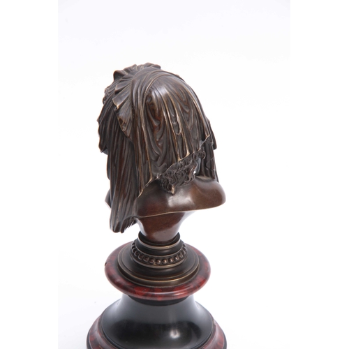 493 - A LATE 19TH CENTURY FRENCH BRONZE BUST OF A YOUNG GIRL mounted on a turned marble and slate soccle 2... 