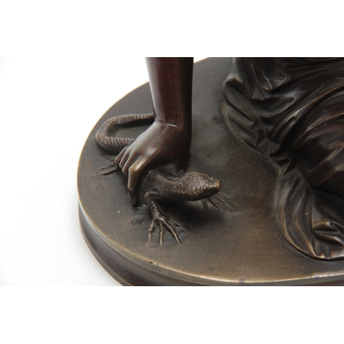 502 - AN ART NOUVEAU STYLE FRENCH BRONZE SCULPTURE OF A SEMI NAKED FEMALE FEEDING A LIZARD 23cm wide 20cm ... 