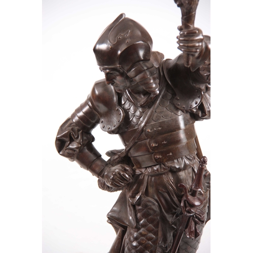 505 - AN EARLY 20th CENTURY PATINATED BRONZED METAL FIGURAL LAMP modelled as a knight holding a torch with... 