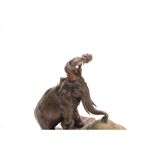 506 - FRANZ BERGMAN. A LATE 19th CENTURY AUSTRIAN COLD PAINTED BRONZE INKWELL modelled as an elephant clim... 