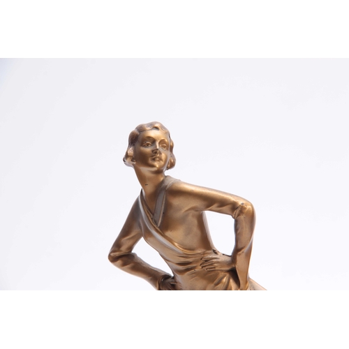 522 - AN EARLY 20TH CENTURY ART DECO COLD-PAINTED BRONZE FIGURE of a young lady, mounted on a stepped marb... 