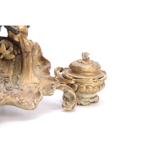 539 - A LATE 19TH CENTURY FRENCH IN THE MANNER OF LINKE ROCOCO STYLE BRONZE AND ORMOLU INKSTAND depicting ... 