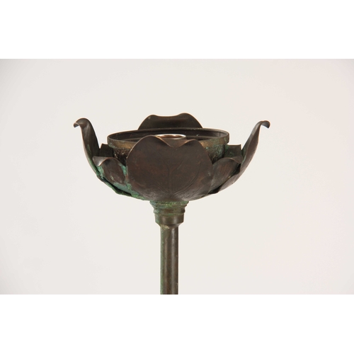 542 - AN ART NOUVEAU GREEN PATINATED BRONZE STANDARD LAMP depicting a Crane stood on a large Lilly pad 149... 