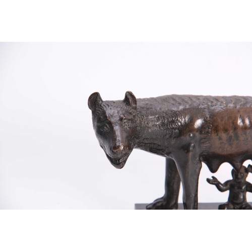 543 - A 19TH CENTURY BRONZE SCULPTURE OF ROMULUS AND REMUS WITH THE SHE WOLF having a rich brown patina 22... 