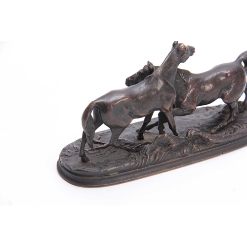 547 - AFTER P. J. MENE, A 19TH CENTURY MINIATURE BRONZE GROUP depicting two horses - signed 14cm wide.