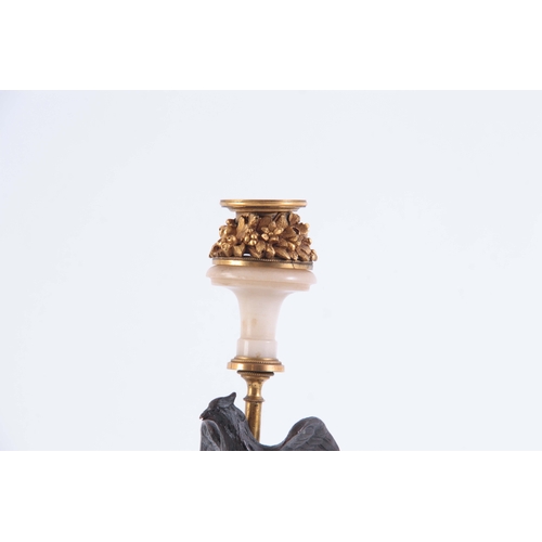 549 - A PAIR OF 19TH CENTURY FRENCH BRONZE, ORMOLU AND MARBLE CANDLESTICKS with square bases and winged ea... 