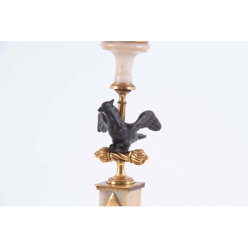 549 - A PAIR OF 19TH CENTURY FRENCH BRONZE, ORMOLU AND MARBLE CANDLESTICKS with square bases and winged ea... 