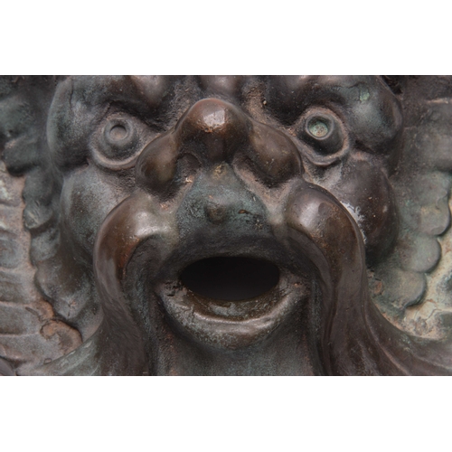 553 - A 19TH CENTURY BRONZE FOUNTAIN MASK 28cm wide 23cm high.