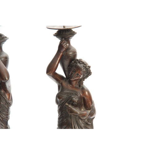 554 - A PAIR OF LATE 19TH CENTURY FRENCH BRONZE FIGURAL CANDELABRA DEPICTING CLASSICAL WATER CARRIERS  mou... 