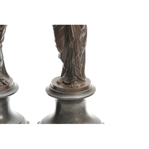 554 - A PAIR OF LATE 19TH CENTURY FRENCH BRONZE FIGURAL CANDELABRA DEPICTING CLASSICAL WATER CARRIERS  mou... 