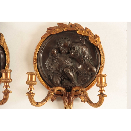 555 - EDWARD WILLIAM WYON, (1811-85) A PAIR OF MID 19TH CENTURY ORMOLU AND BRONZE WALL SCONCES both having... 