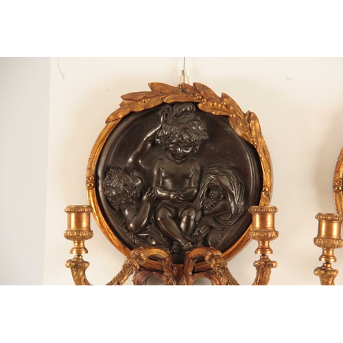 555 - EDWARD WILLIAM WYON, (1811-85) A PAIR OF MID 19TH CENTURY ORMOLU AND BRONZE WALL SCONCES both having... 