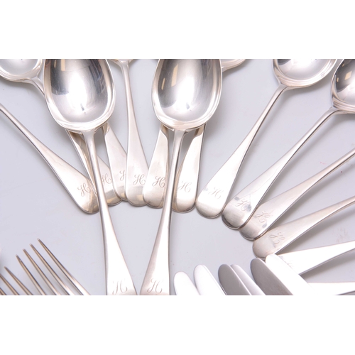 570 - AN ELIZABETH II 65 PIECE CANTEEN OF SILVER CUTLERY comprising Spoons, Forks, and Knives of various p... 