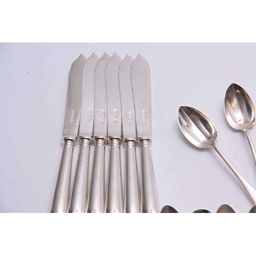 570 - AN ELIZABETH II 65 PIECE CANTEEN OF SILVER CUTLERY comprising Spoons, Forks, and Knives of various p... 