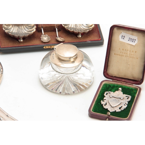 604 - A SELECTION OF SILVER ITEMS INCLUDING a Dressing table Mirror, Sheild Pendant, Dressing Table Brush,... 