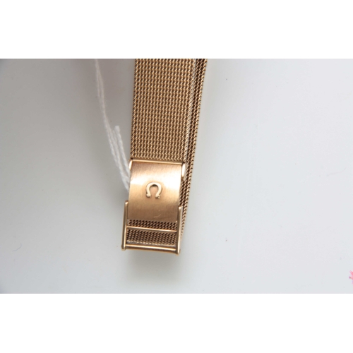 613 - A GENTLEMANS 9CT GOLD OMEGA DE VILLE WRIST WATCH AND BRACELET having a gold dial with gold baton mar... 