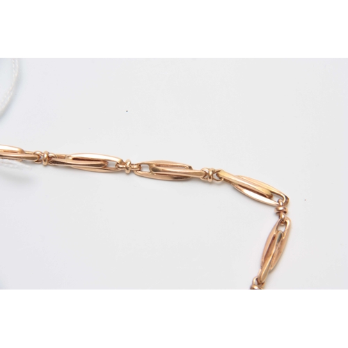 670 - A 14CT YELLOW GOLD NECK CHAIN of unusual double interlinked and elongated sections 58cm overall 53gr... 