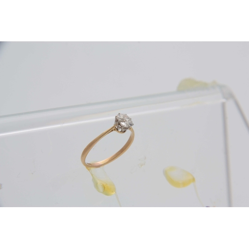 677 - AN 18CT YELLOW GOLD CLAW SET SOLITAIRE DIAMOND RING approx .6ct