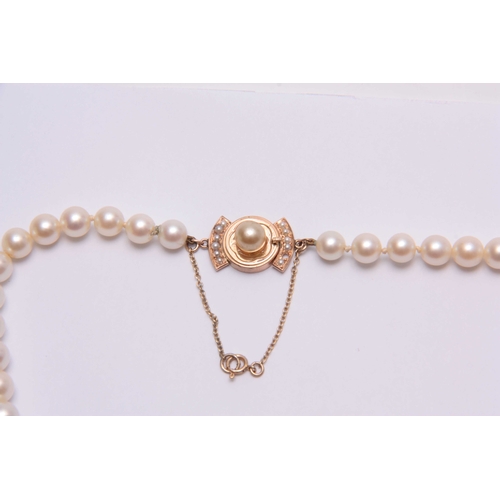 684 - A GRADUATED PEARL NECKLACE with 14ct gold clasp - hallmarked 14ct  46cm long