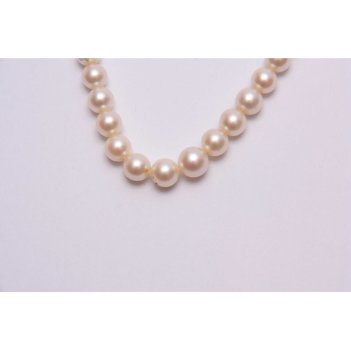 684 - A GRADUATED PEARL NECKLACE with 14ct gold clasp - hallmarked 14ct  46cm long