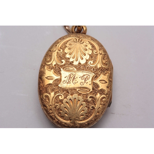 697 - A 15CT GOLD OVAL LOCKET INLAID WITH ENAMEL AND PEARL DECORATION engraved and initialled to the back ... 