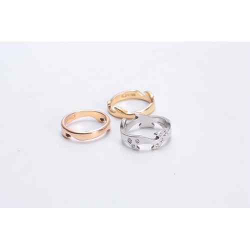 699 - AN 18CT GOLD INTERLOCKING RING BY GEORGE JENSON having White, Rose and Yellow gold bands set with di... 