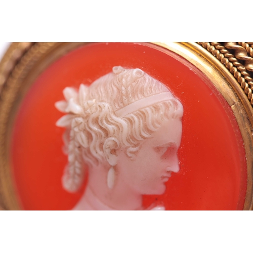 703 - A LATE 19TH CENTURY MINIATURE HARDSTONE CAMEO BROOCH WITH 15CT GOLD MOULDED SURROUND - tested for 15... 