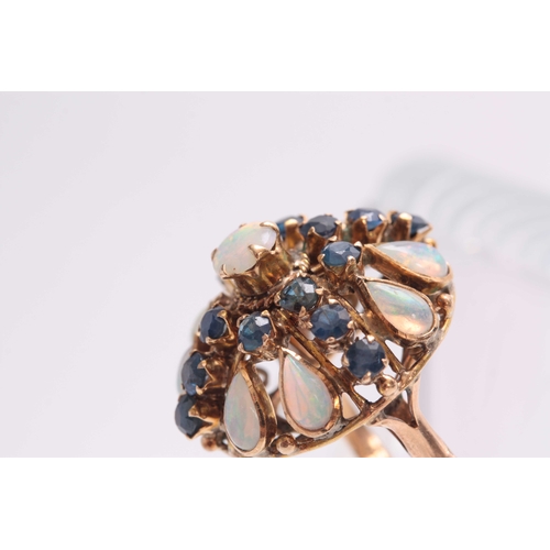 705 - AN 18CT GOLD OPAL AND SAPPHIRE DRESS RING - hallmarked 18ct gold