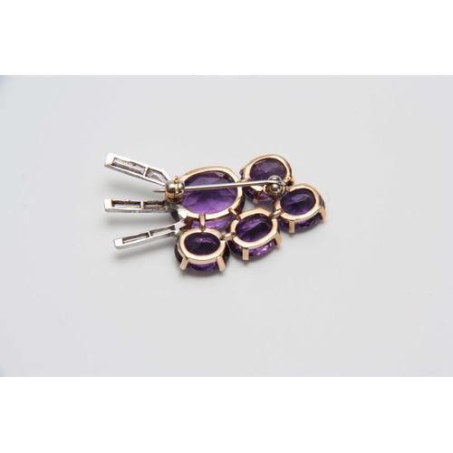 716 - AN ART DECO STYLE YELLOW AND WHITE GOLD SET AMETHYST AND DIAMOND SPRAY BROOCH 4cm across