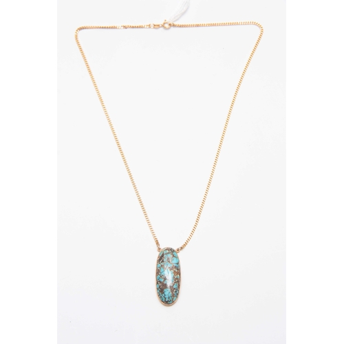 717 - A .375 HALLMARKED YELLOW GOLD SLENDER NECK CHAIN AND LARGE OVAL TURQUOISE PENDANT 49.5cm long