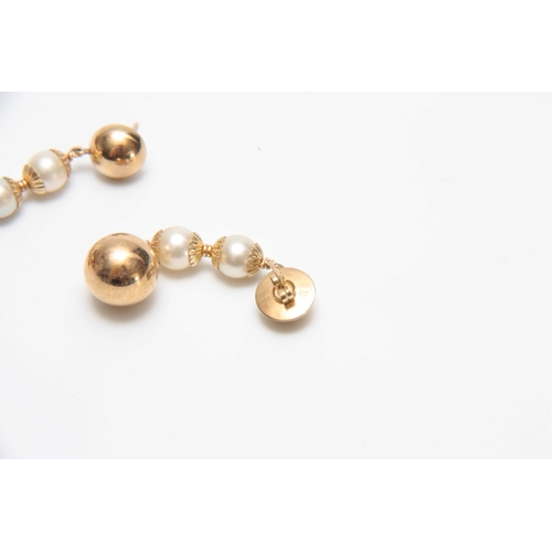 724 - A PAIR OF YELLOW GOLD AND PEARL EARRINGS with ball drops 4.5cm overall