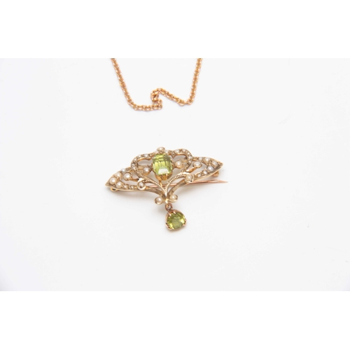 725 - AN ART NOUVEAU 9CT GOLD SEED PEARL AND PERIDOT PENDANT of openwork floral design with fine Gold NECK... 