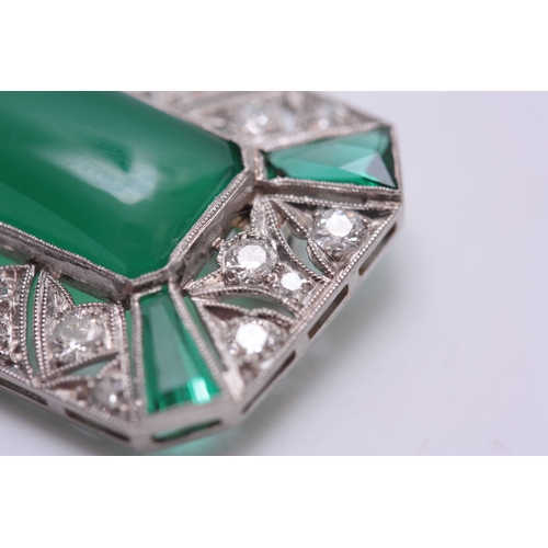 748 - AN ART DECCO EMERALD AND DIAMOND SET WHITE METAL BAR BROOCH with large cushion shaped centre stone a... 