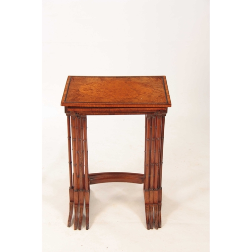 1000 - AN EARLY 20TH CENTURY AMBOYNA AND BURR WALNUT NEST OF TABLES having four graduated tables standing o... 