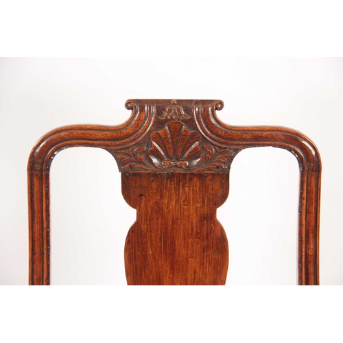 1001 - A GEO II STAINED BEECH GENTLEMANS IRISH OPEN ARMCHAIR with shaped top rail having carved shell above... 