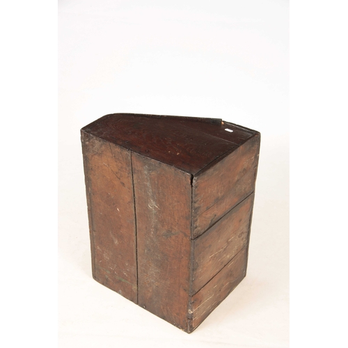 1002 - A LATE 17TH CENTURY OAK DESK BOX with angled fall having strap iron hinges, above a floral flower, c... 