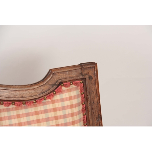 1003 - AN 18TH CENTURY WALNUT ITALIAN THREE SEATER SETTEE OF SHAPED SERPENTINE FORM having a panelled raise... 