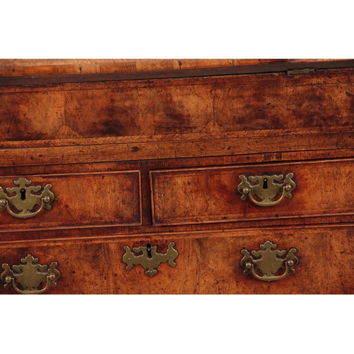 1005 - AN EARLY 18TH CENTURY QUEEN ANNE WALNUT BUREAU HAVING SUPERB ORIGINAL COLOUR AND PATINA the hinged a... 