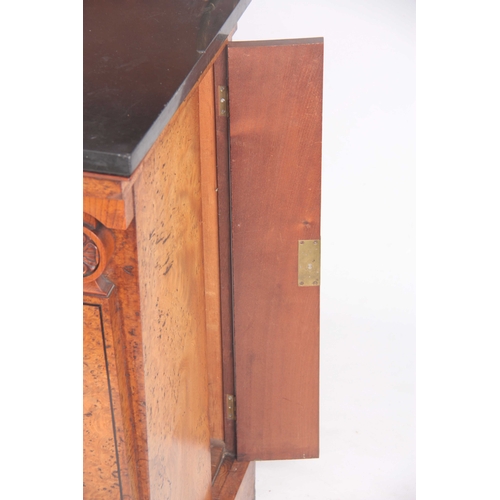 1006 - A REGENCY BURR ELM LIBRARY CABINET IN THE MANOR OF GEORGE BULLOCK with raised superstructure having ... 