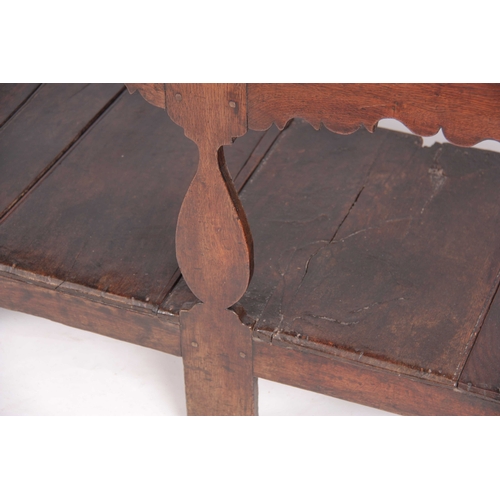 1007 - AN EARLY 18TH CENTURY JOINED OAK SILHOUETTE POT BOARD DRESSER AND RACK with moulded cornice above tw... 