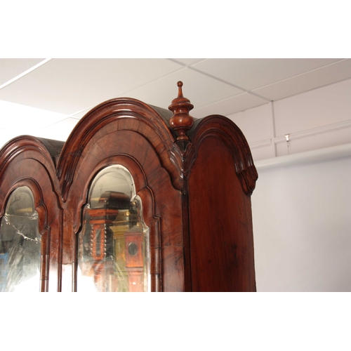 1008 - A WILLIAM AND MARY HERRING-BANDED AND FIGURED WALNUT BUREAU BOOKCASE the double-domed top with origi... 