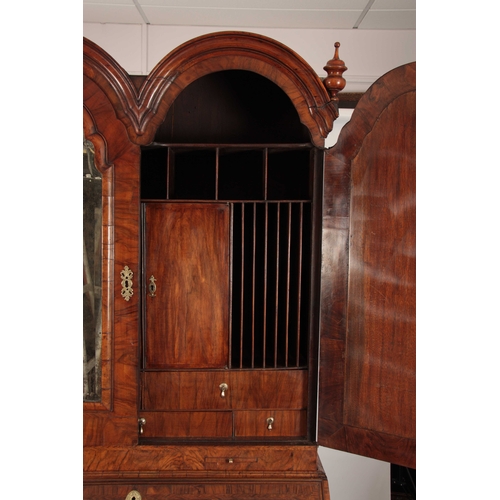 1008 - A WILLIAM AND MARY HERRING-BANDED AND FIGURED WALNUT BUREAU BOOKCASE the double-domed top with origi... 