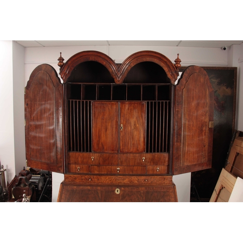 1008 - A WILLIAM AND MARY HERRING-BANDED AND FIGURED WALNUT BUREAU BOOKCASE the double-domed top with origi... 