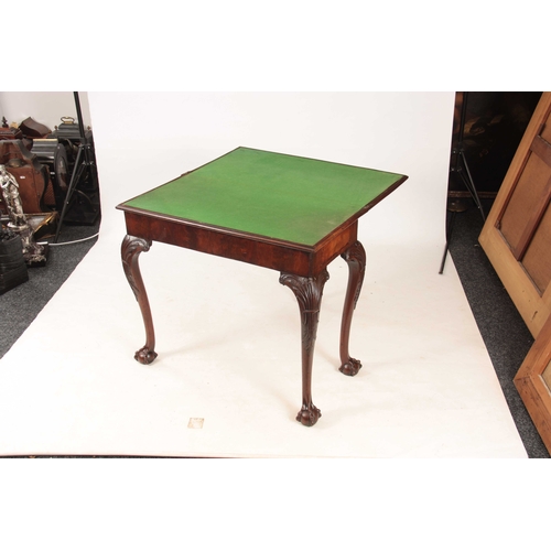 1012 - A MID 18TH CENTURY IRISH MAHOGANY FOLD OVER CARD TABLE the green baize lined playing surface with a ... 