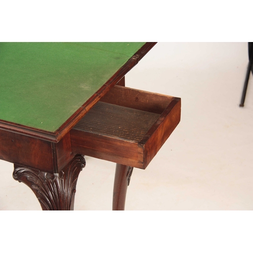 1012 - A MID 18TH CENTURY IRISH MAHOGANY FOLD OVER CARD TABLE the green baize lined playing surface with a ... 