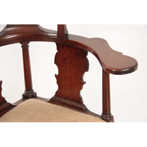 1019 - A GOOD GEORGE II MAHOGANY CORNER CHAIR with shaped raised back and fret cut vase-shaped splats, wide... 