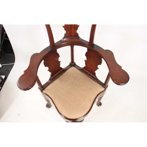 1019 - A GOOD GEORGE II MAHOGANY CORNER CHAIR with shaped raised back and fret cut vase-shaped splats, wide... 