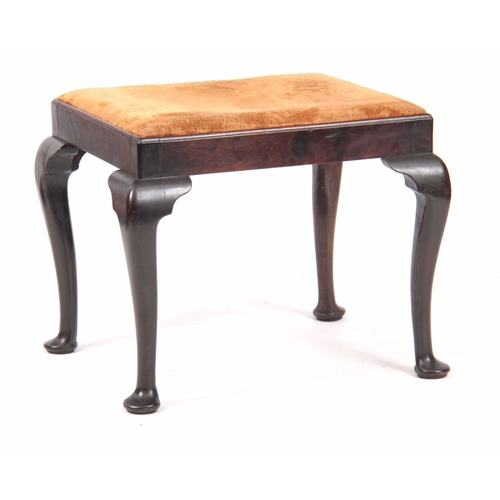 1020 - A GEORGE III MAHOGANY STOOL with drop-in seat and caddy edged rails; standing on cabriole legs with ... 