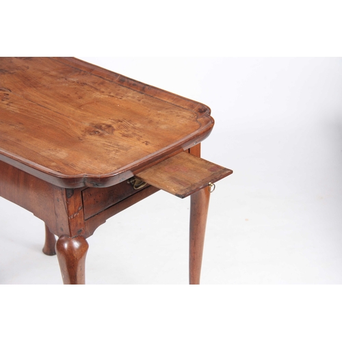 1021 - AN EARLY 18TH CENTURY FIGURED WALNUT SILVER TABLE with cross-grained moulded book-matched veneered t... 